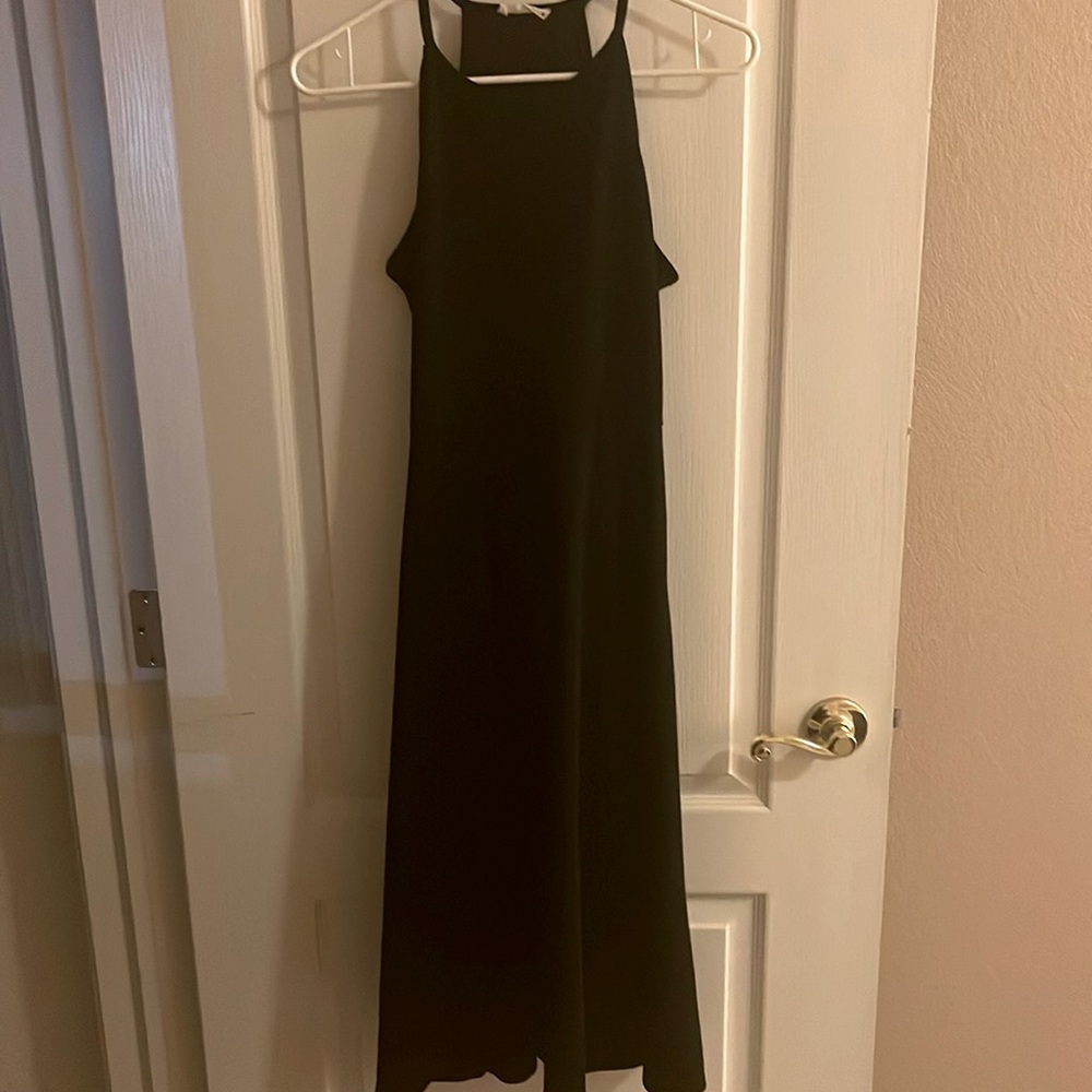 Black dress by Olivia Rae.  Size large. Falls below knee midway.